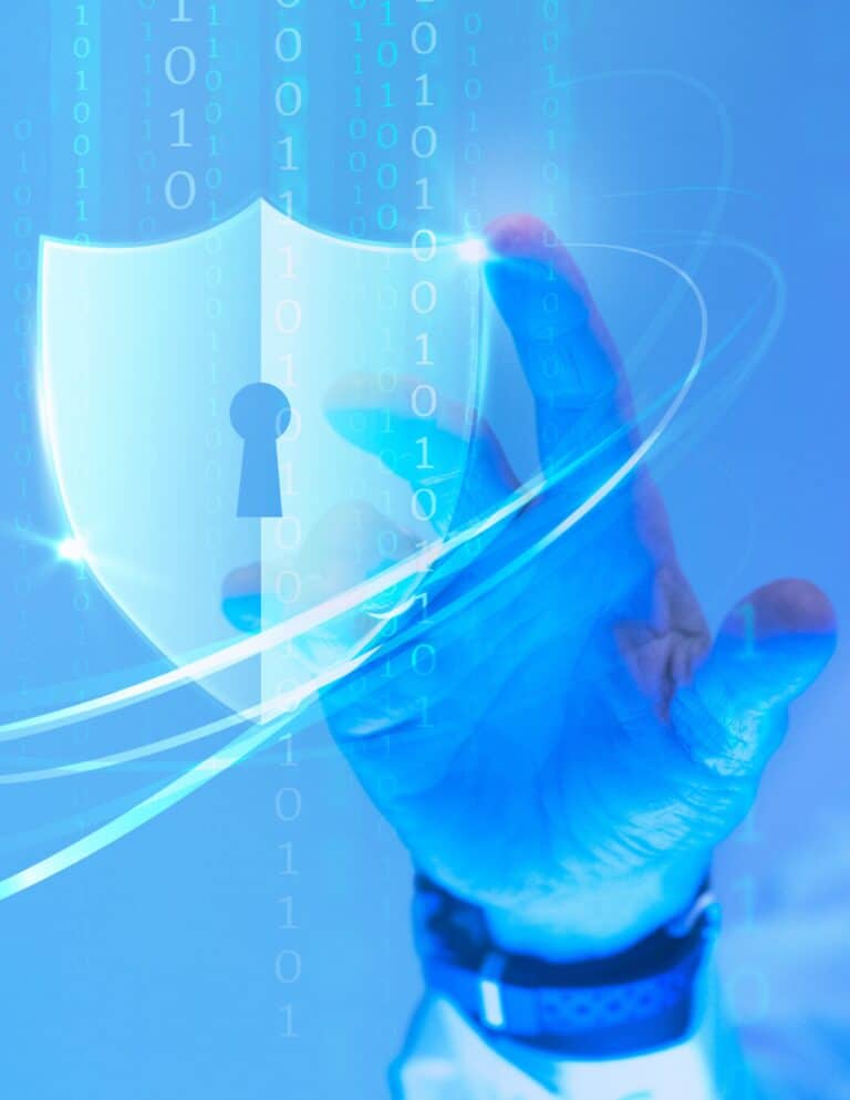 A hand reaches out to touch a shield with a lock on it. There is binary code overlaid over it.